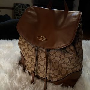 Coach Backpack in great condition. Minor ink stains on inside of bag.